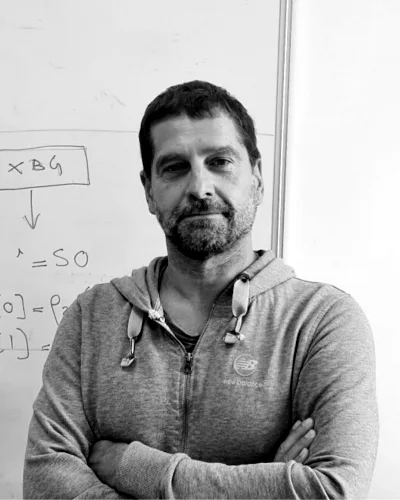 Sebastiano Vigna in front of a whiteboard with a random number generator diagram